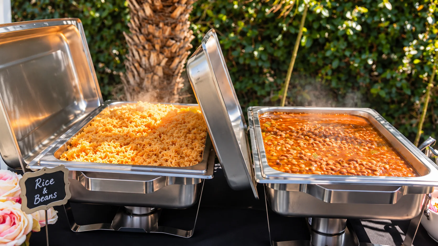 Mexican rice and pinto beans in chafing dishes