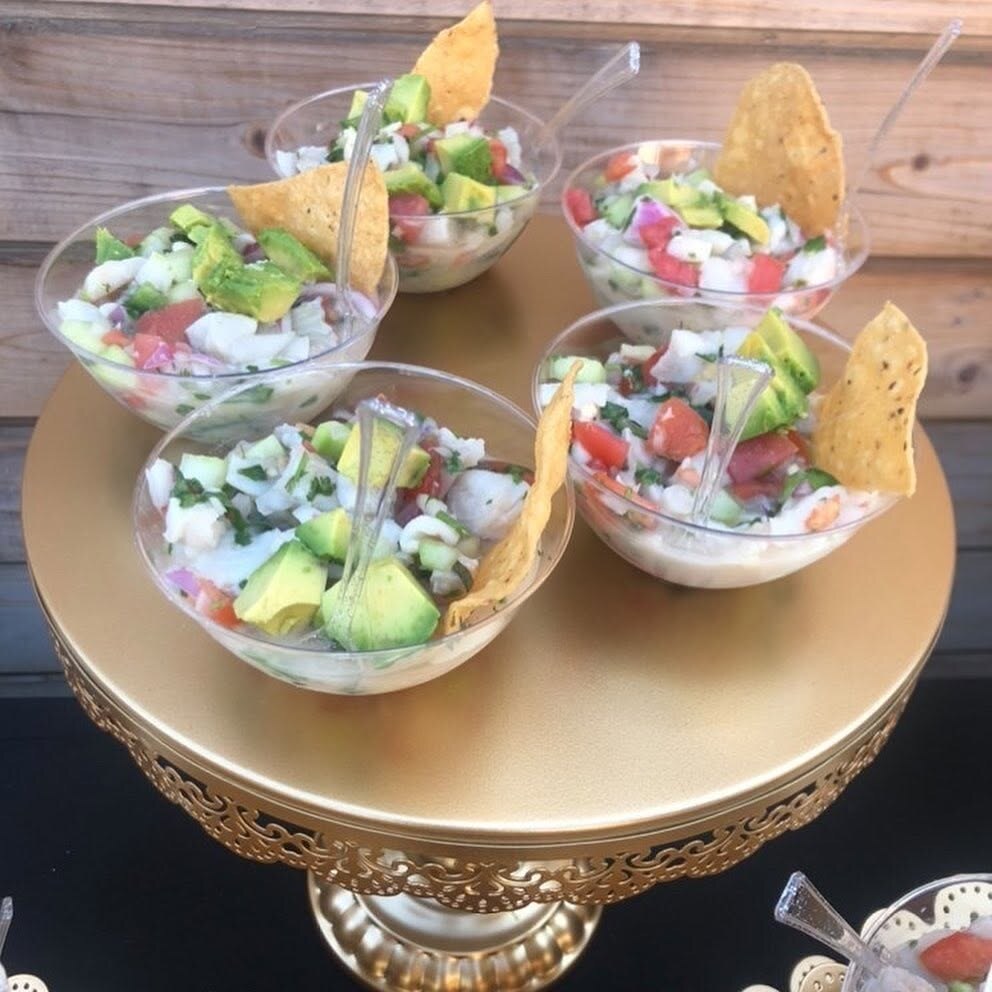 Individual ceviche appetizers served with tortilla chips