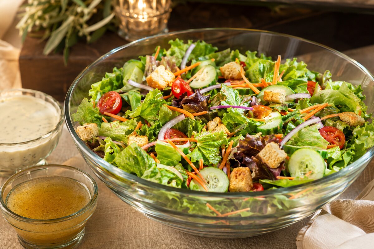 Fresh garden salad with mixed greens, vegetables, croutons and dressing