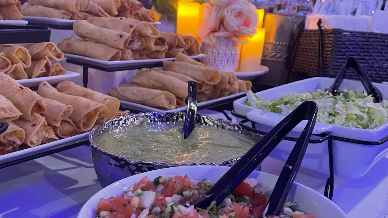 Crispy taquitos displayed with fresh sides